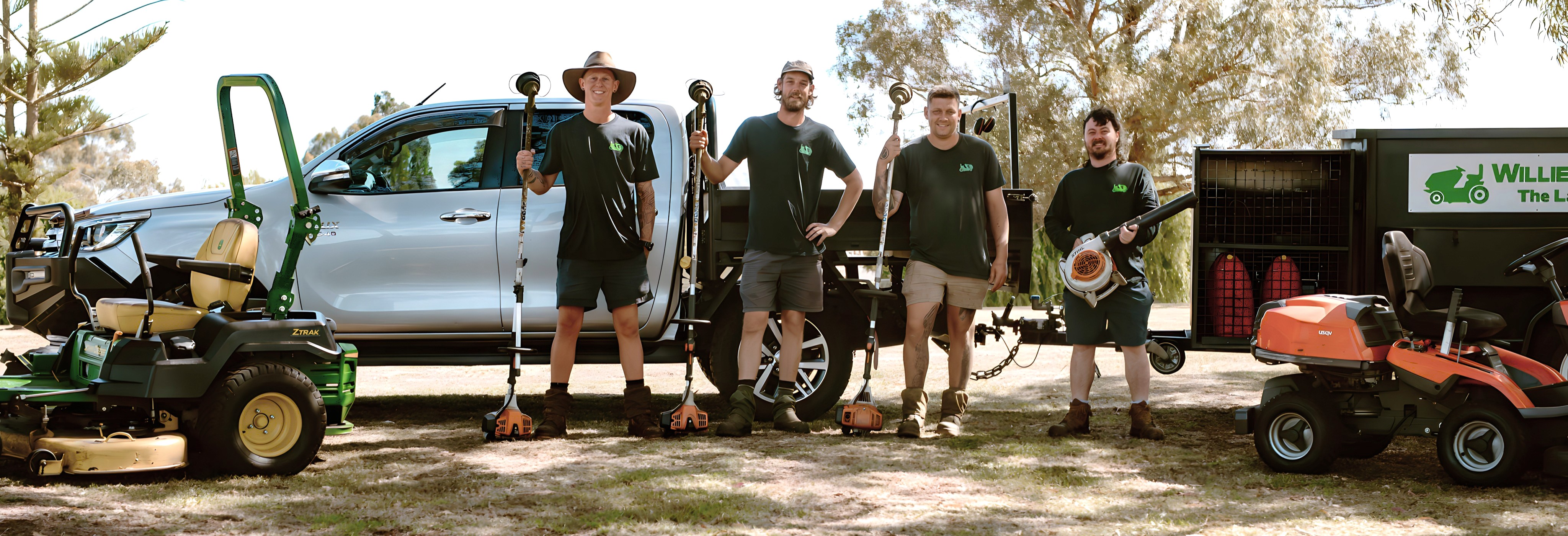 A photo of the Willie's Groundskeeping team and their equipment